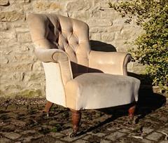 Howard and Sons button back antique antique armchair1.jpg
